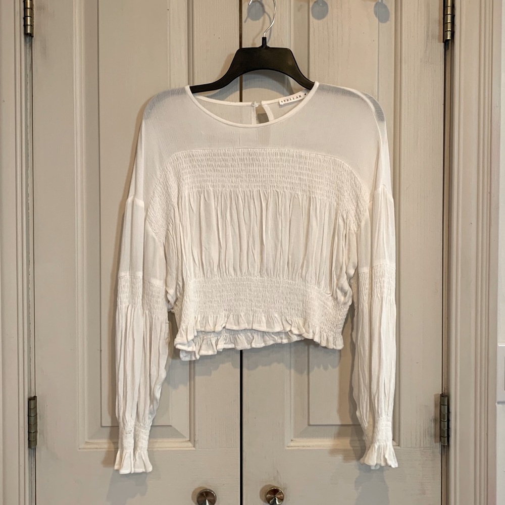 Stylish white long sleeved crop